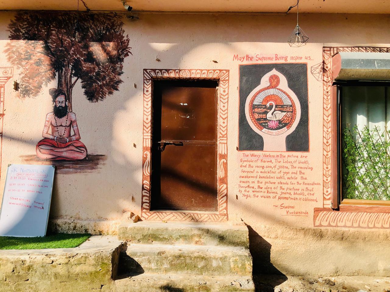 Hand-painted meditation mural at the practice space